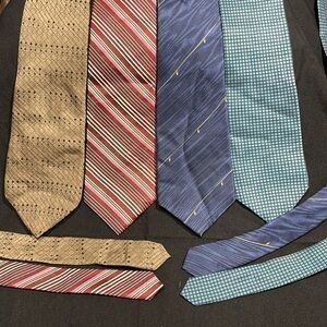 Four DKNY neckties.